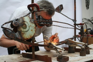 Ecologist Justin Irvine welding.
